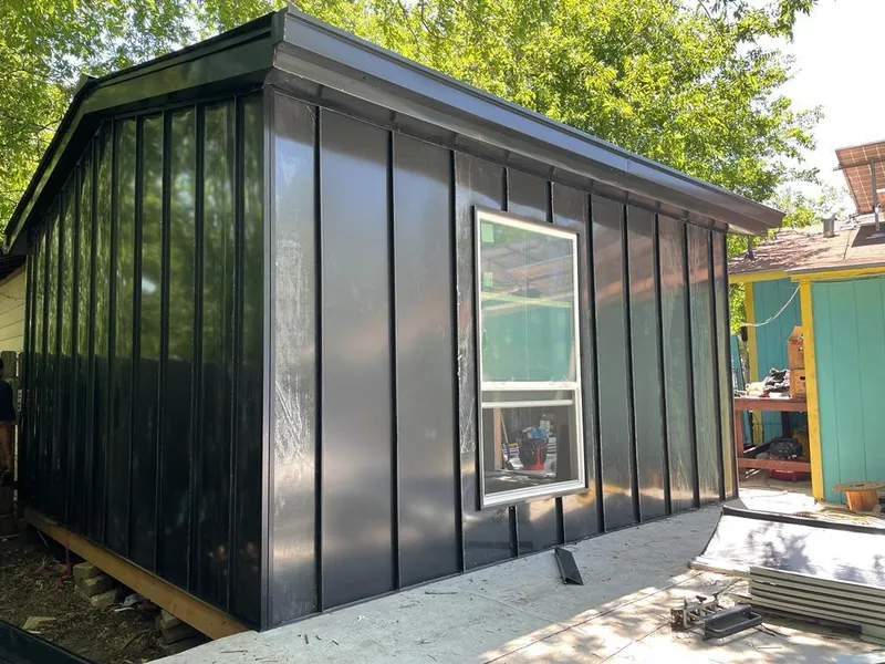 Black standing seam metal wall panels for Metal Roof Installation in Ridgewood village